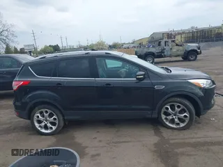 2013 Ford Escape Titanium с VIN 1FMCU9J9XDUC53579, выставлен на аукционе IAAI как лот 42166603 с пробегом 112 736 миль миль и . История ставок и продаж доступна на DreamBid. Изображение 13.