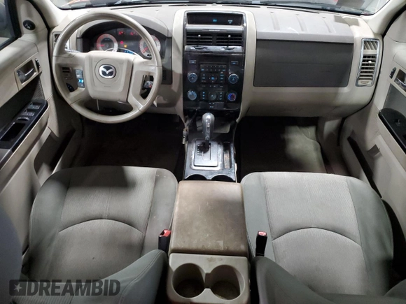 2011 Mazda Tribute Touring with VIN 4F2CY0C71BKM06780, listed as a Copart auction lot 77748114 with 144,163 mi miles and Salvage Title. Bid and sale history available at carsss.com. Image 8.