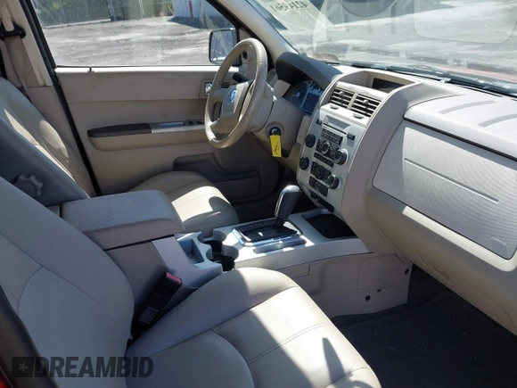 2008 Mercury Mariner with VIN 4M2CU91138KJ47288, listed as a IAAI auction lot 42149561 with 158,460 mi miles and . Bid and sale history available at DreamBid. Image 5.