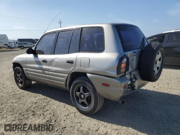 2000 Toyota RAV4 with VIN JT3GP10V2Y0052306, listed as a Copart auction lot 54726325 with 244,910 mi miles and Salvage title. Bid and sale history available at DreamBid. Image 2.