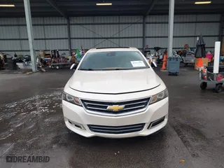2014 Chevrolet Impala LTZ with VIN 1G1155S38EU105260, listed as a IAAI auction lot 42012082 with 230,407 mi miles. Bid and sale history available at carsss.com. Image 12.