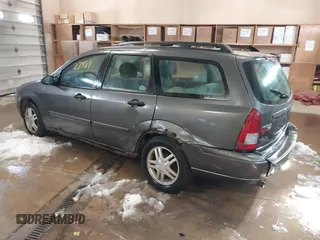 2005 Ford Focus SE with VIN 1FAFP36N45W158796, listed as a IAAI auction lot 41823987 with 145,803 mi miles and . Bid and sale history available at carsss.com. Image 3.