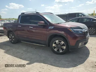 2019 Honda Ridgeline RTL-E with VIN 5FPYK3F71KB002046, listed as a Copart auction lot 61934455 with 131,674 mi miles and Salvage title. Bid and sale history available at DreamBid. Image 4.
