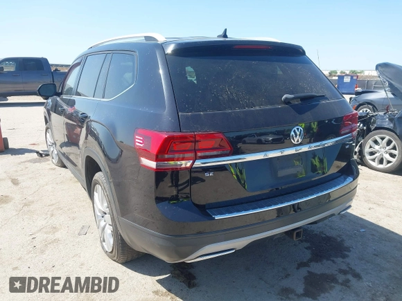 2019 Volkswagen Atlas SE with VIN 1V2WR2CA4KC595211, listed as a IAAI auction lot 41986643 with 96,299 mi miles and . Bid and sale history available at DreamBid. Image 3.