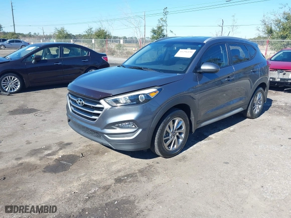 2017 Hyundai Tucson SE Plus with VIN KM8J33A45HU420349, listed as a IAAI auction lot 41296190 with 77,910 mi miles. Bid and sale history available at carsss.com. Image 2.