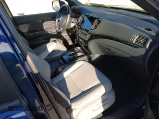 2020 Honda Passport Touring with VIN 5FNYF7H90LB004665, listed as a IAAI auction lot 41669821 with 59,768 mi miles and . Bid and sale history available at DreamBid. Image 5.