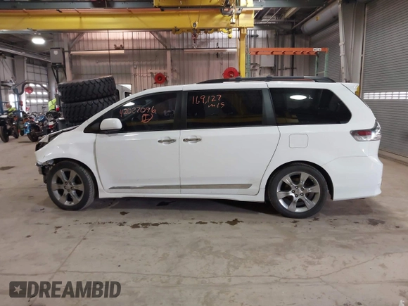2014 Toyota Sienna SE with VIN 5TDXK3DC7ES497390, listed as a IAAI auction lot 42037096 with 169,127 mi miles and . Bid and sale history available at DreamBid. Image 15.