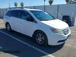 2011 Honda Odyssey EX-L with VIN 5FNRL5H67BB091292, listed as a IAAI auction lot 42540146 with 197,291 mi miles and . Bid and sale history available at DreamBid. Image 1.