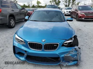 2018 BMW M2 z VIN WBS1J5C53JVD36649, wystawiony jako Copart lot #57961455 z przebiegiem 55 751 mil mil oraz Szkoda całkowita • Salvage title. Historia ofert i sprzedaży dostępna na DreamBid. Obrazek 5.