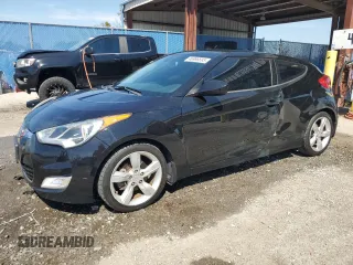 2014 Hyundai Veloster with VIN KMHTC6AD0EU207850, listed as a Copart auction lot 46986695 with 138,024 mi miles and Salvage Title. Bid and sale history available at carsss.com. Image 1.