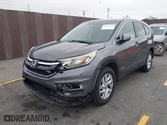 2015 Honda CR-V EX with VIN 3CZRM3H51FG704087, listed as a IAAI auction lot 42074521 with 74,610 mi miles and . Bid and sale history available at carsss.com. Image 2.
