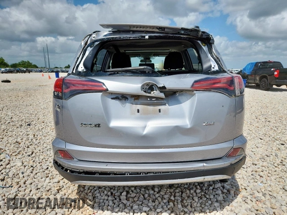 2018 Toyota RAV4 XLE with VIN JTMWFREV4JD132500, listed as a Copart auction lot 59790105 with 48,066 mi miles and Salvage title. Bid and sale history available at DreamBid. Image 6.