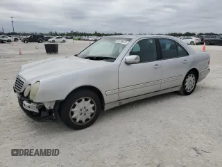 2000 Mercedes-Benz E-Class with VIN WDBJF70J6YB011278, listed as a Copart auction lot 88706615 with 147,667 mi miles and Salvage Title. Bid and sale history available at carsss.com. Image 1.