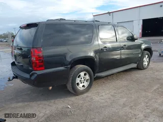 2010 Chevrolet Suburban Commercial with VIN 1GNUKHE38AR190423, listed as a IAAI auction lot 41361377 with 215,187 mi miles. Bid and sale history available at carsss.com. Image 4.