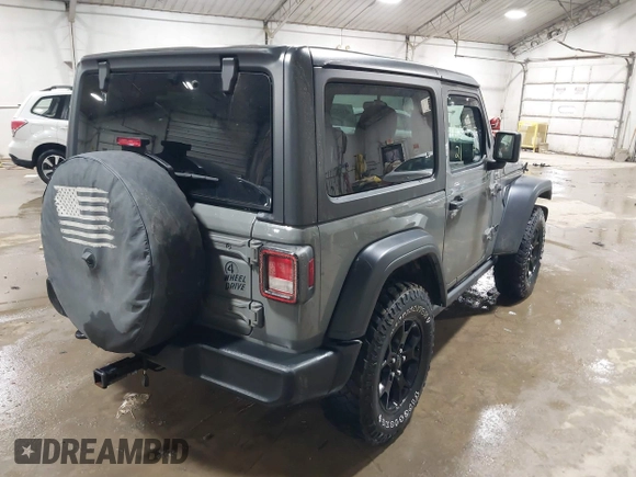 2021 Jeep Wrangler Sport S with VIN 1C4GJXAN7MW647786, listed as a IAAI auction lot 41685775 with 31,907 mi miles and . Bid and sale history available at DreamBid. Image 4.
