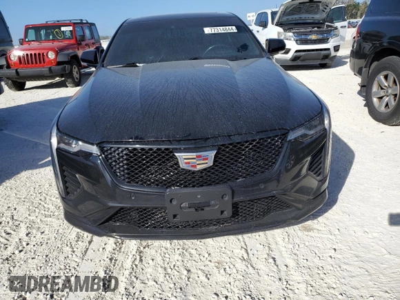 2021 Cadillac CT4 V-Series z VIN 1G6DH5RLXM0124791, wystawiony jako Copart lot #77314844 z przebiegiem 61 452 mil mil oraz Nie do naprawy • Non repairable. Historia ofert i sprzedaży dostępna na DreamBid. Obrazek 5.