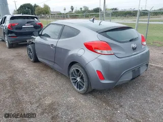 2016 Hyundai Veloster with VIN KMHTC6AD5GU297452, listed as a IAAI auction lot 41142723 with 101,417 mi miles. Bid and sale history available at carsss.com. Image 3.