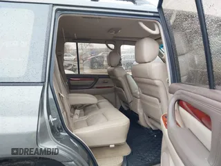2000 Lexus LX 470 z VIN JT6HT00W8Y0092556, wystawiony jako IAAI lot #41727615 z przebiegiem 156 262 mil mil oraz . Historia ofert i sprzedaży dostępna na DreamBid. Obrazek 8.