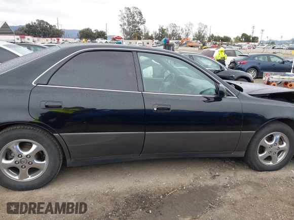 1999 Lexus ES 300 с VIN JT8BF28G9X5060374, выставлен на аукционе IAAI как лот 41809173 с пробегом 240 274 миль миль и . История ставок и продаж доступна на DreamBid. Изображение 13.