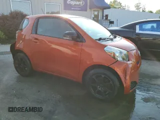 2012 Scion iQ z VIN JTNJJXB0XCJ020404, wystawiony jako Copart lot #62157565 z przebiegiem 82 869 mil mil oraz Nie do naprawy • Non repairable. Historia ofert i sprzedaży dostępna na DreamBid. Obrazek 4.
