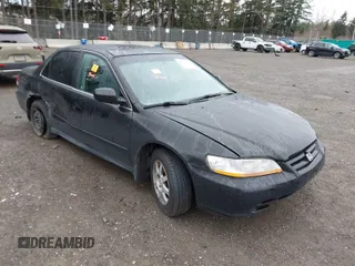 2002 Honda Accord SE z VIN 1HGCG66802A158278, wystawiony jako IAAI lot #41645469 z przebiegiem 264 329 mil mil oraz . Historia ofert i sprzedaży dostępna na DreamBid. Obrazek 1.