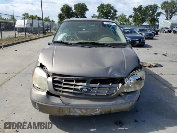 2005 Ford Freestar SE z VIN 2FMDA51635BA60614, wystawiony jako Copart lot #60058044 z przebiegiem 228 858 mil mil oraz Szkody całkowita. Historia ofert i sprzedaży dostępna na DreamBid. Obrazek 5.