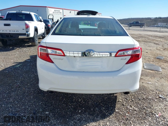 2014 Toyota Camry SE with VIN 4T1BK1FK2EU540026, listed as a IAAI auction lot 41678692 with 85,275 mi miles. Bid and sale history available at carsss.com. Image 15.