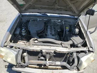 2004 Nissan Frontier XE with VIN 1N6DD26TX4C447116, listed as a Copart auction lot 59432335 with 127,001 mi miles and Salvage title. Bid and sale history available at DreamBid. Image 11.