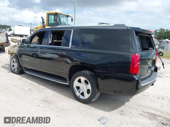 2015 Chevrolet Suburban LTZ with VIN 1GNSCKKC8FR156706, listed as a IAAI auction lot 40638221 with Not Provided miles and . Bid and sale history available at DreamBid. Image 3.