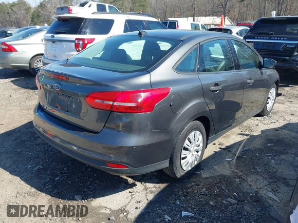 2017 Ford Focus S z VIN 1FADP3E29HL269607, wystawiony jako IAAI lot #41654836 z przebiegiem 101 645 mil mil oraz . Historia ofert i sprzedaży dostępna na DreamBid. Obrazek 4.