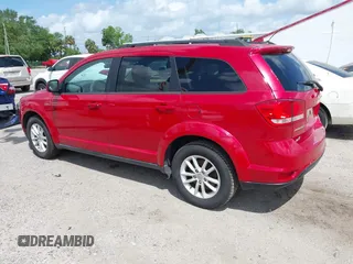 2015 Dodge Journey SXT with VIN 3C4PDCBB2FT560777, listed as a IAAI auction lot 42017660 with 132,628 mi miles and . Bid and sale history available at DreamBid. Image 3.