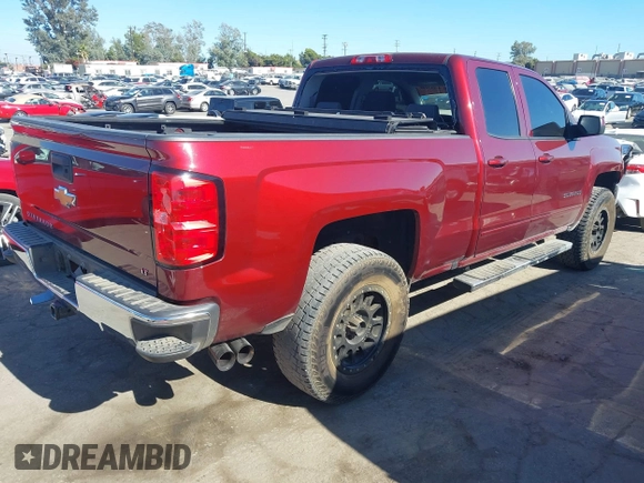 2017 Chevrolet Silverado 1500 LT with VIN 1GCRCREC0HZ171084, listed as a IAAI auction lot 40142848 with 137,420 mi miles and . Bid and sale history available at DreamBid. Image 4.