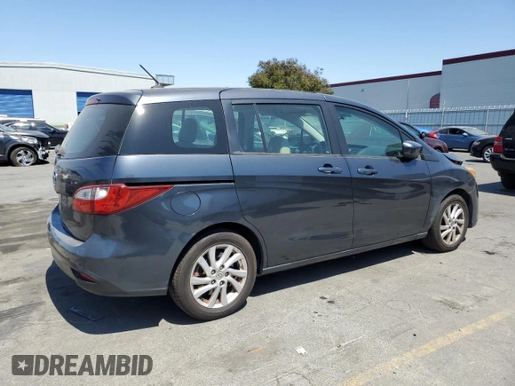 2012 Mazda 5 Sport with VIN JM1CW2BL0C0103969, listed as a Copart auction lot 64404424 with 133,398 mi miles and Salvage Title. Bid and sale history available at DreamBid. Image 3.