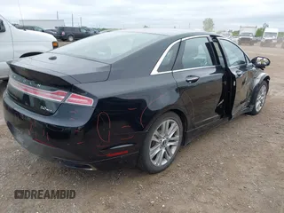 2016 Lincoln MKZ with VIN 3LN6L2G99GR601799, listed as a IAAI auction lot 42350755 with 106,144 mi miles and . Bid and sale history available at DreamBid. Image 4.