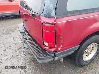 1994 Ford Explorer Eddie Bauer z VIN 1FMDU34XXRUE69130, wystawiony jako IAAI lot #41594121 z przebiegiem 146 118 mil mil oraz . Historia ofert i sprzedaży dostępna na DreamBid. Obrazek 12.