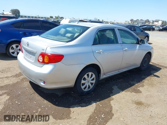 2010 Toyota Corolla with VIN 1NXBU4EE1AZ319230, listed as a IAAI auction lot 41988978 with 238,497 mi miles. Bid and sale history available at carsss.com. Image 4.