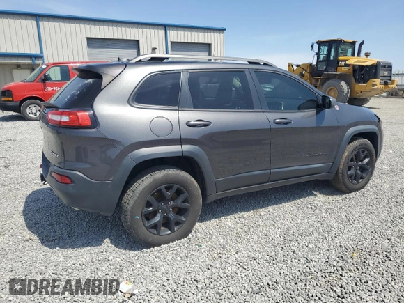 2015 Jeep Cherokee Trailhawk z VIN 1C4PJMBS2FW610618, wystawiony jako Copart lot #52243625 z przebiegiem 136 234 mil mil oraz Szkoda całkowita • Salvage title. Historia ofert i sprzedaży dostępna na DreamBid. Obrazek 3.