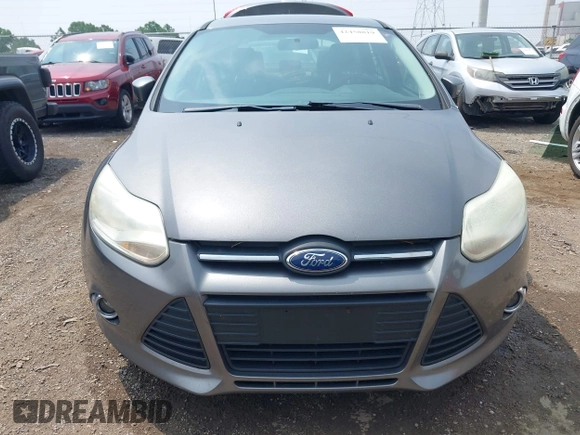 2012 Ford Focus SE with VIN 1FAHP3F26CL186645, listed as a IAAI auction lot 42458819 with 99,470 mi miles and . Bid and sale history available at DreamBid. Image 12.