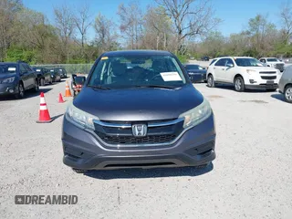 2015 Honda CR-V LX with VIN 2HKRM3H31FH557779, listed as a IAAI auction lot 42098299 with 211,683 mi miles and . Bid and sale history available at carsss.com. Image 12.