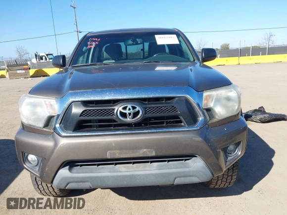 2012 Toyota Tacoma z VIN 5TFUU4EN4CX040417, wystawiony jako IAAI lot #41662802 z przebiegiem 221 186 mil mil oraz . Historia ofert i sprzedaży dostępna na DreamBid. Obrazek 13.