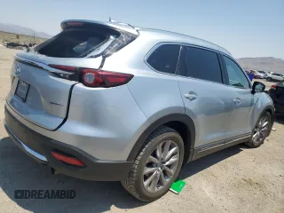 2021 Mazda CX-9 Grand Touring z VIN JM3TCADY4M0512268, wystawiony jako Copart lot #62683464 z przebiegiem Nie podano mil oraz Szkoda całkowita • Salvage title. Historia ofert i sprzedaży dostępna na DreamBid. Obrazek 3.