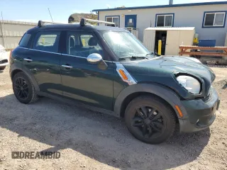 2014 MINI Countryman with VIN WMWZB3C51EWR40111, listed as a Copart auction lot 50274045 with 138,073 mi miles and Salvage title. Bid and sale history available at DreamBid. Image 4.