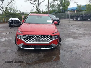 2022 Hyundai Santa Fe SEL z VIN 5NMS24AJ7NH431010, wystawiony jako IAAI lot #42235797 z przebiegiem 18 496 mil mil oraz . Historia ofert i sprzedaży dostępna na DreamBid. Obrazek 13.