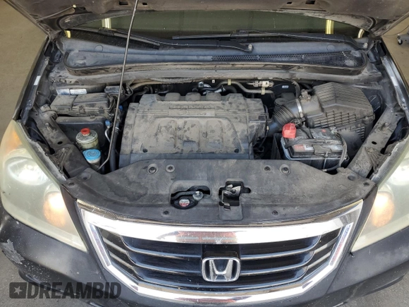 2010 Honda Odyssey Touring with VIN 5FNRL3H9XAB067890, listed as a Copart auction lot 63520575 with 213,582 mi miles and Clean title. Bid and sale history available at DreamBid. Image 12.