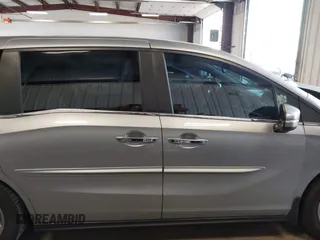 2018 Honda Odyssey EX-L z VIN 5FNRL6H70JB059653, wystawiony jako IAAI lot #42324330 z przebiegiem 115 623 mil mil oraz . Historia ofert i sprzedaży dostępna na DreamBid. Obrazek 14.