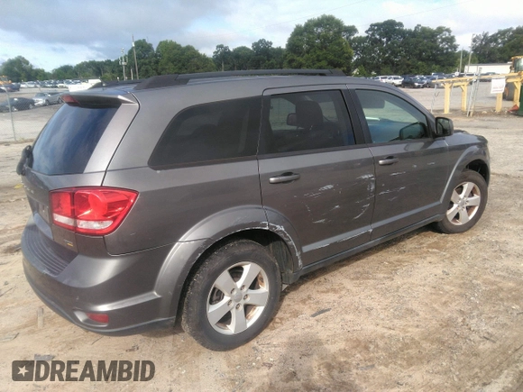 2012 Dodge Journey SXT with VIN 3C4PDCBG9CT153241, listed as a IAAI auction lot 42640265 with 184,719 mi miles and . Bid and sale history available at DreamBid. Image 4.