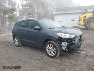 2019 Hyundai Tucson Value with VIN KM8J33A44KU995257, listed as a IAAI auction lot 41672206 with 63,090 mi miles. Bid and sale history available at carsss.com. Image 1.