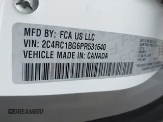 2023 Chrysler Pacifica Touring L with VIN 2C4RC1BG6PR531640, listed as a IAAI auction lot 42251680 with 31,638 mi miles and . Bid and sale history available at DreamBid. Image 9.