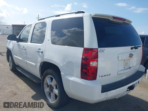 2007 Chevrolet Tahoe LT with VIN 1GNFC13J97R314853, listed as a IAAI auction lot 42684980 with 312,399 mi miles and . Bid and sale history available at DreamBid. Image 3.