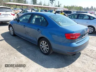 2015 Volkswagen Jetta Sedan 1.8T SE with VIN 3VWD17AJ1FM270114, listed as a IAAI auction lot 42128816 with 111,701 mi miles. Bid and sale history available at carsss.com. Image 3.